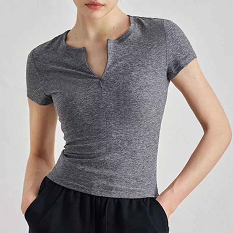 Top de yoga ajustado con cremallera y manga corta