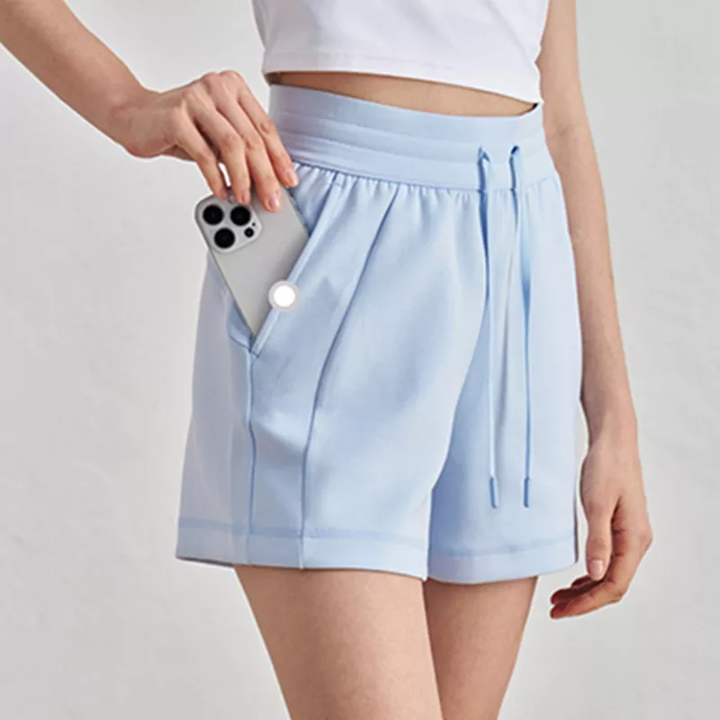 Pantalones de yoga holgados y simplificados de un cuarto de largo